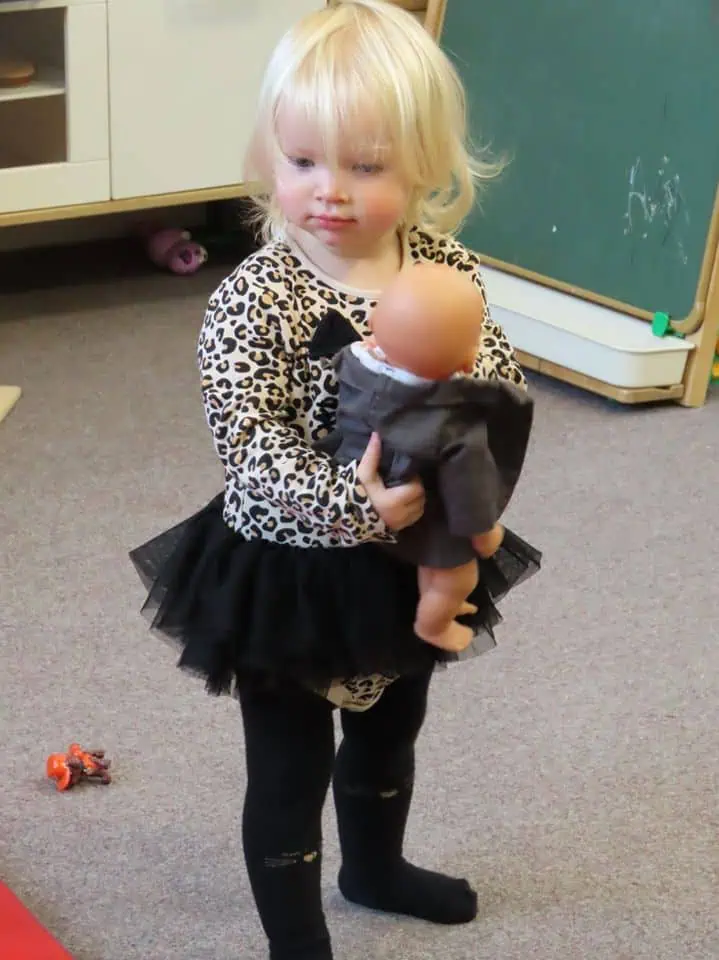 Playing with dolls on Halloween